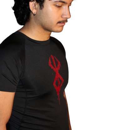 Person wearing a black t-shirt with Brand of Sacrifice compression shirt