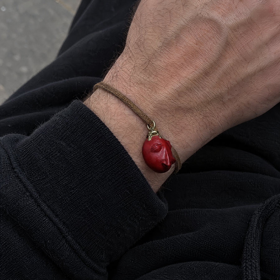 Behelit bracelet worn on the wrist