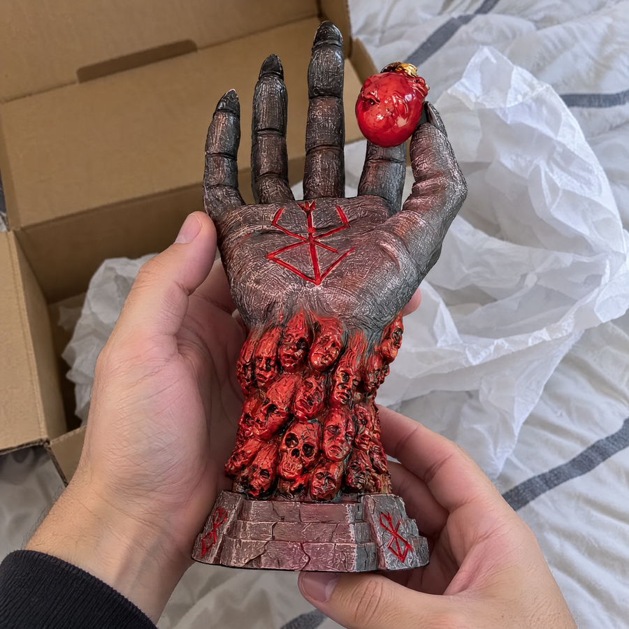 God Hand ornament held after unboxing