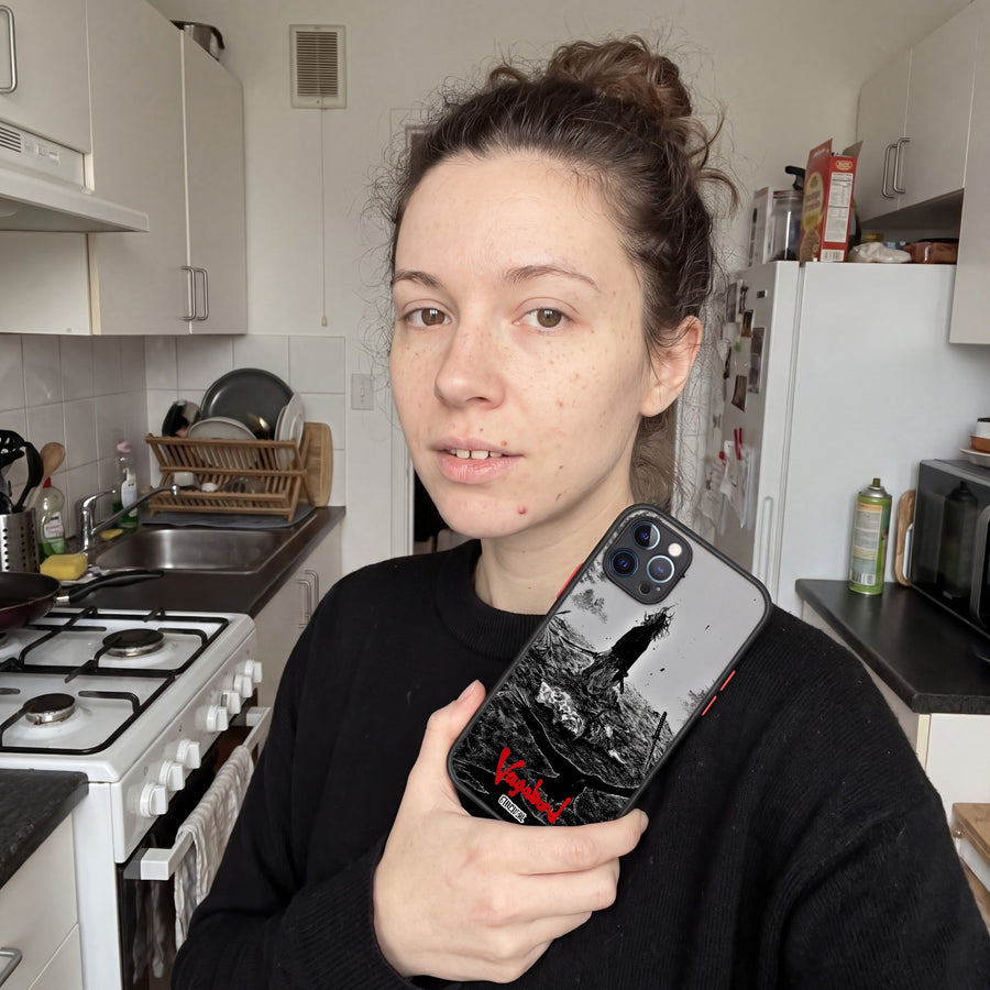 Vagabond Way of the Sword phone case held in a kitchen