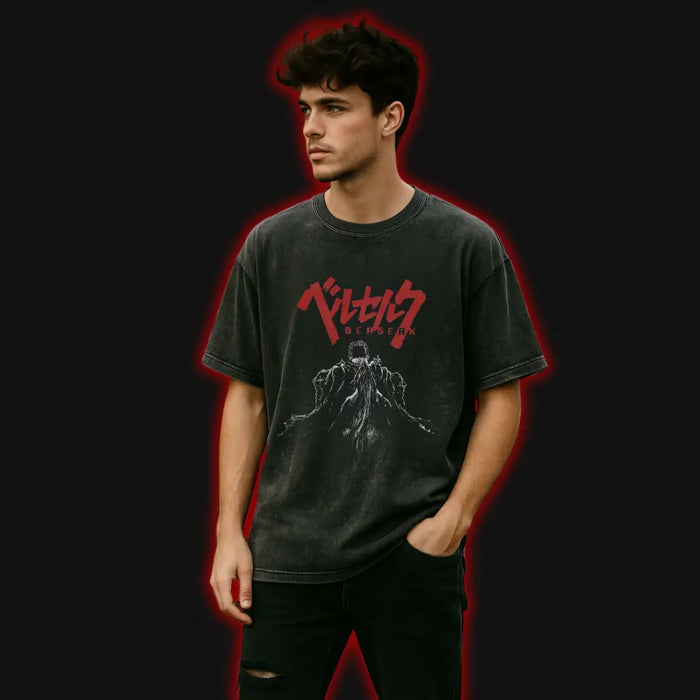 A person wearing a black crew neck t-shirt with a vintage-inspired graphic design in red.